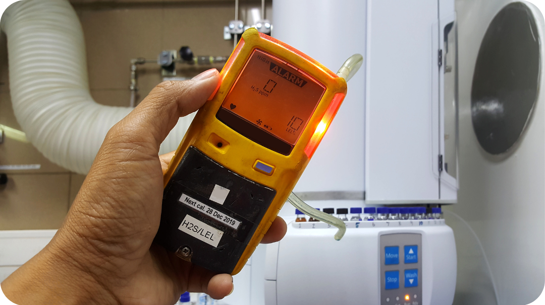 A gas safety engineer testing out a boiler